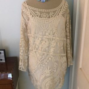 Cream colored, lace dress